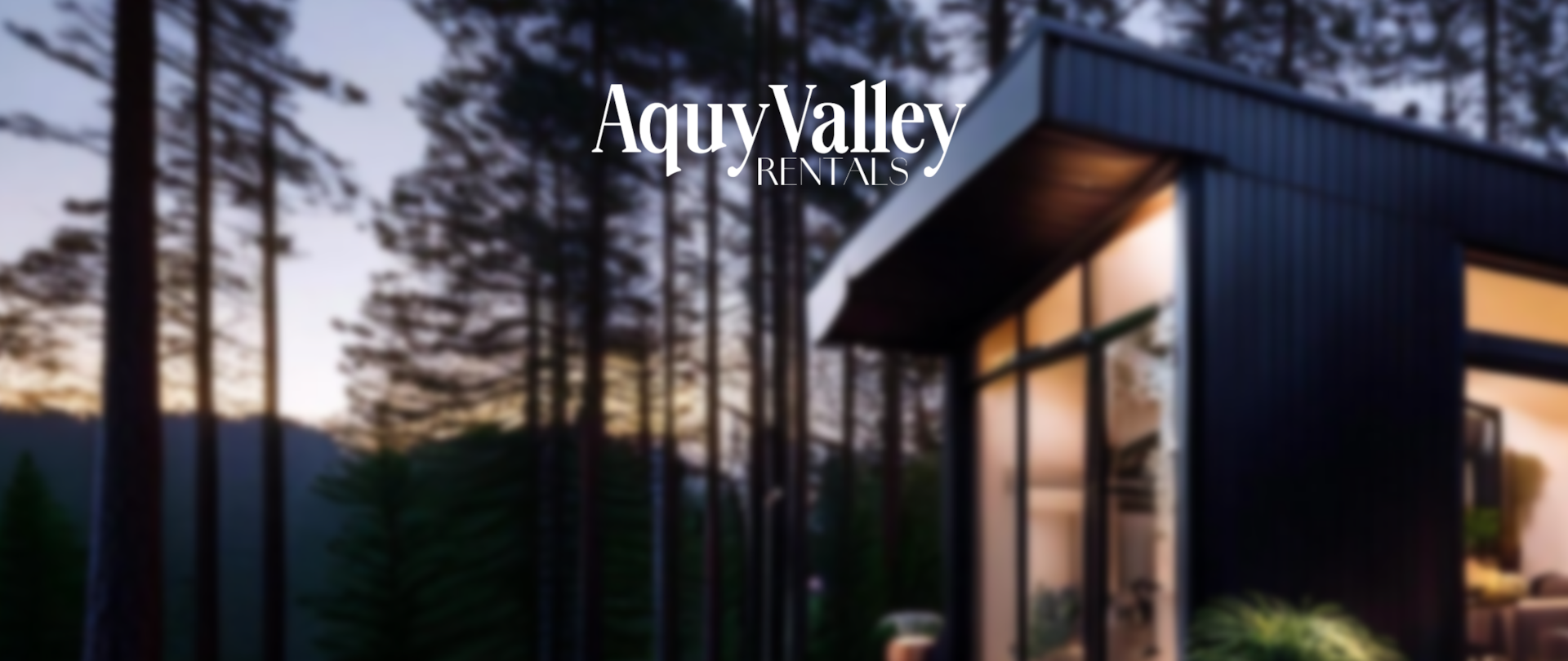 Cabin exterior — golden hour, modern rustic architecture, warm light through large windows, surrounded by tall hardwood trees