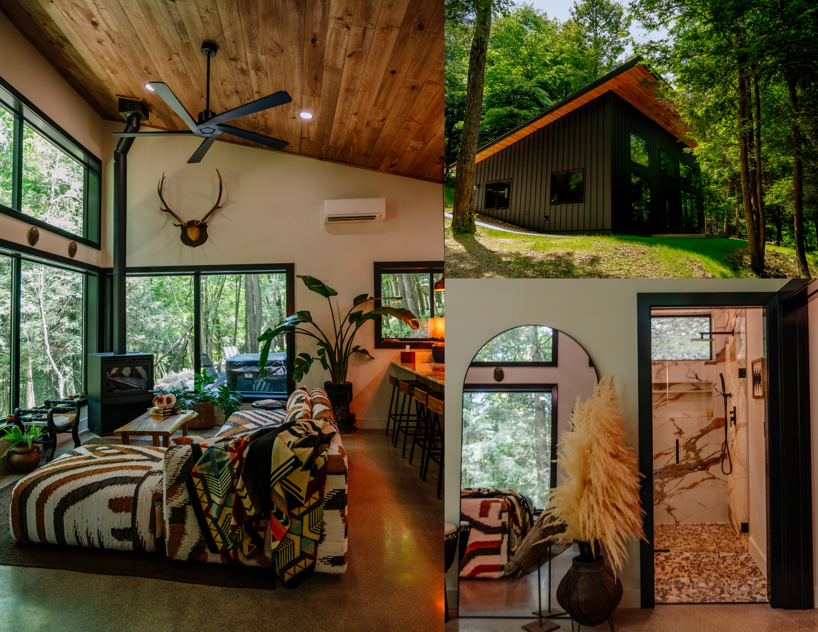 Cabin living room — sofa by stone fireplace, soft textured throw, cosy reading nook, large window view of snowy or autumn forest